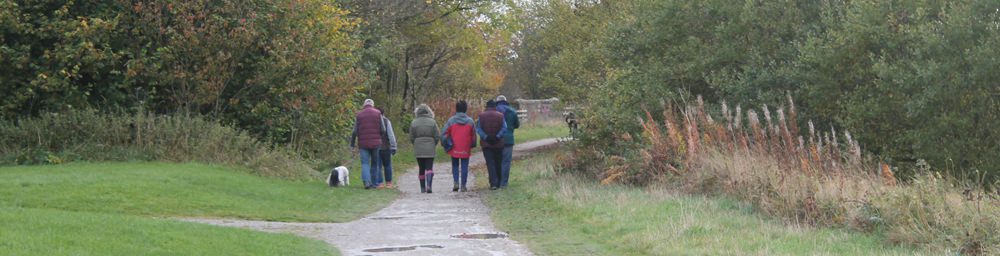 walkers on the white peak loop in derbyshire