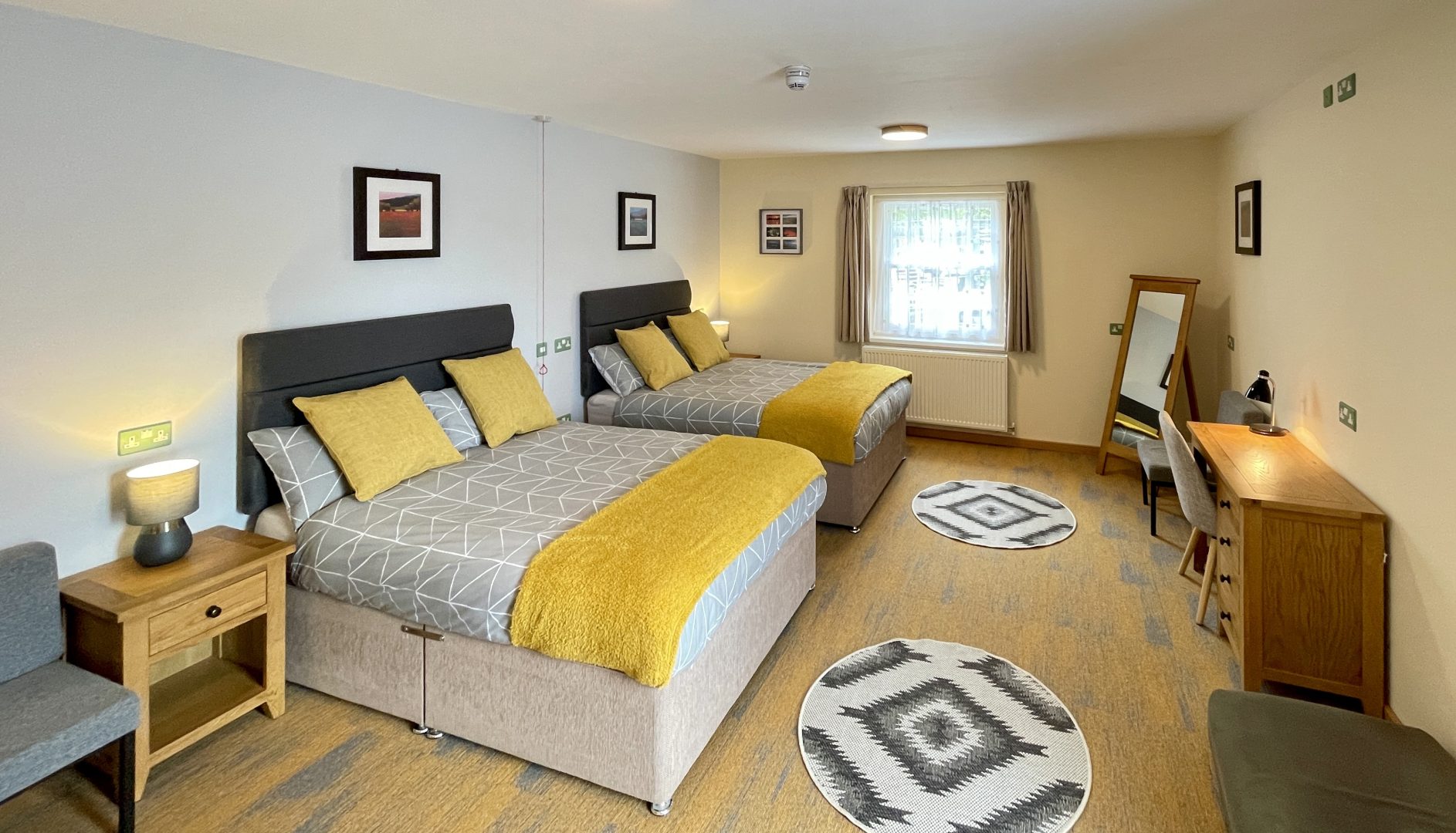 Accessible bedroom with two double beds