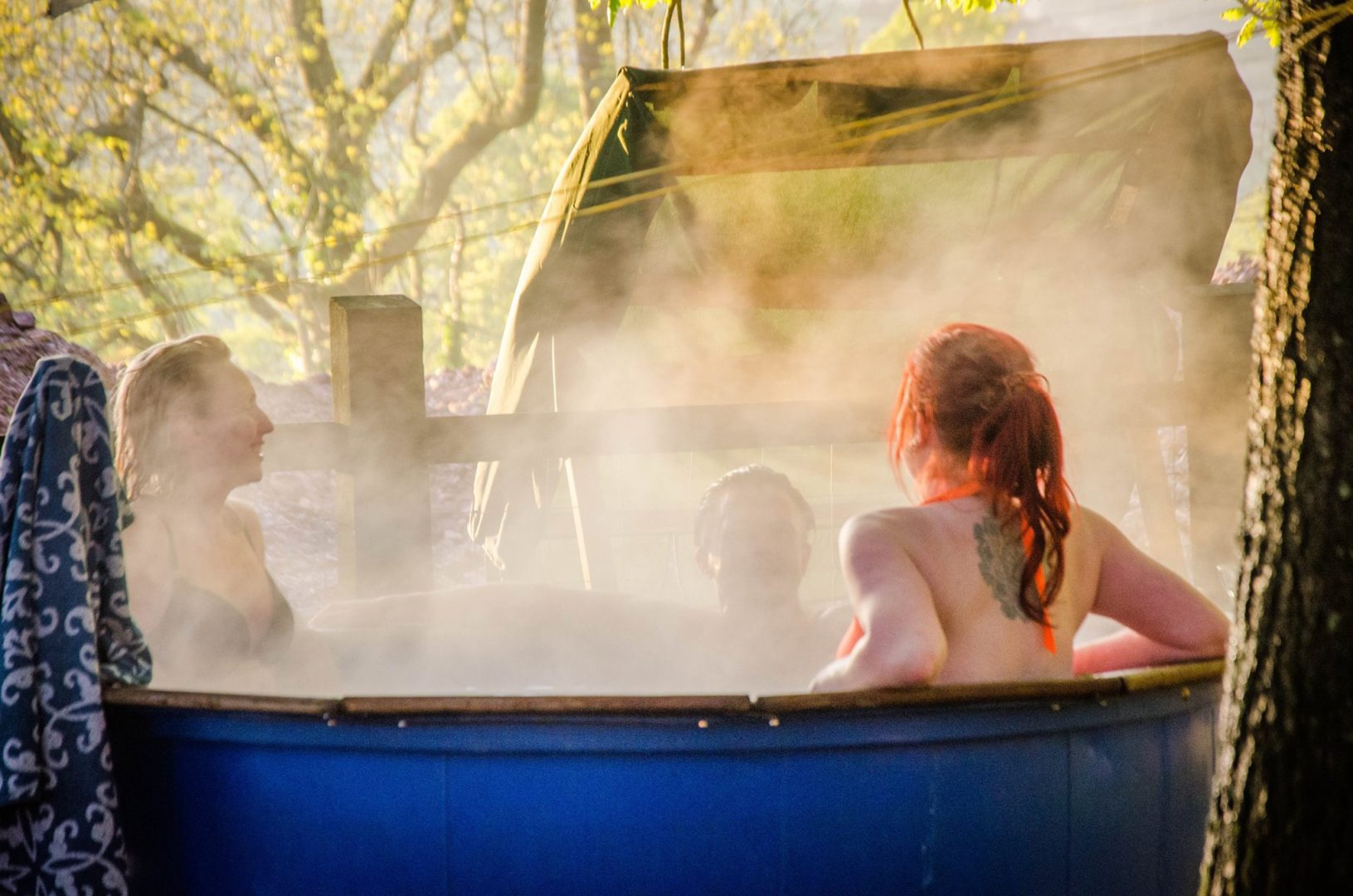 People in a steaming hot tub