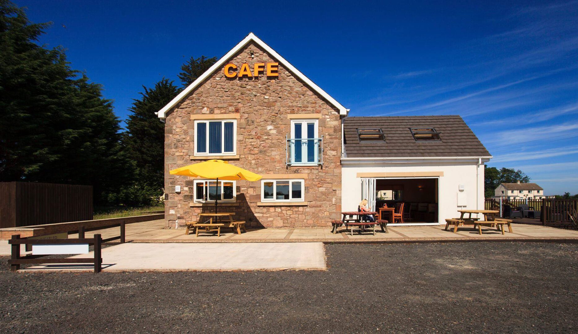 Front exterior view of bunkhouse and bistro