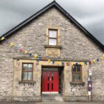 Exterior of stone village hall