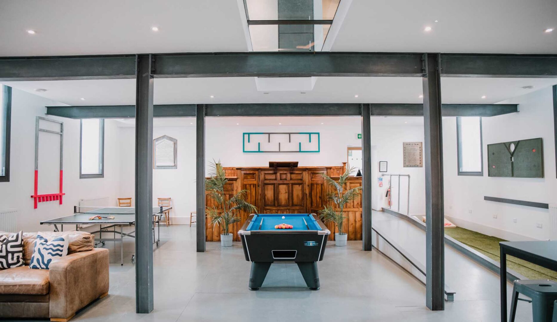 Main lounge with blue pool table at Wye Valley Bunkhouse