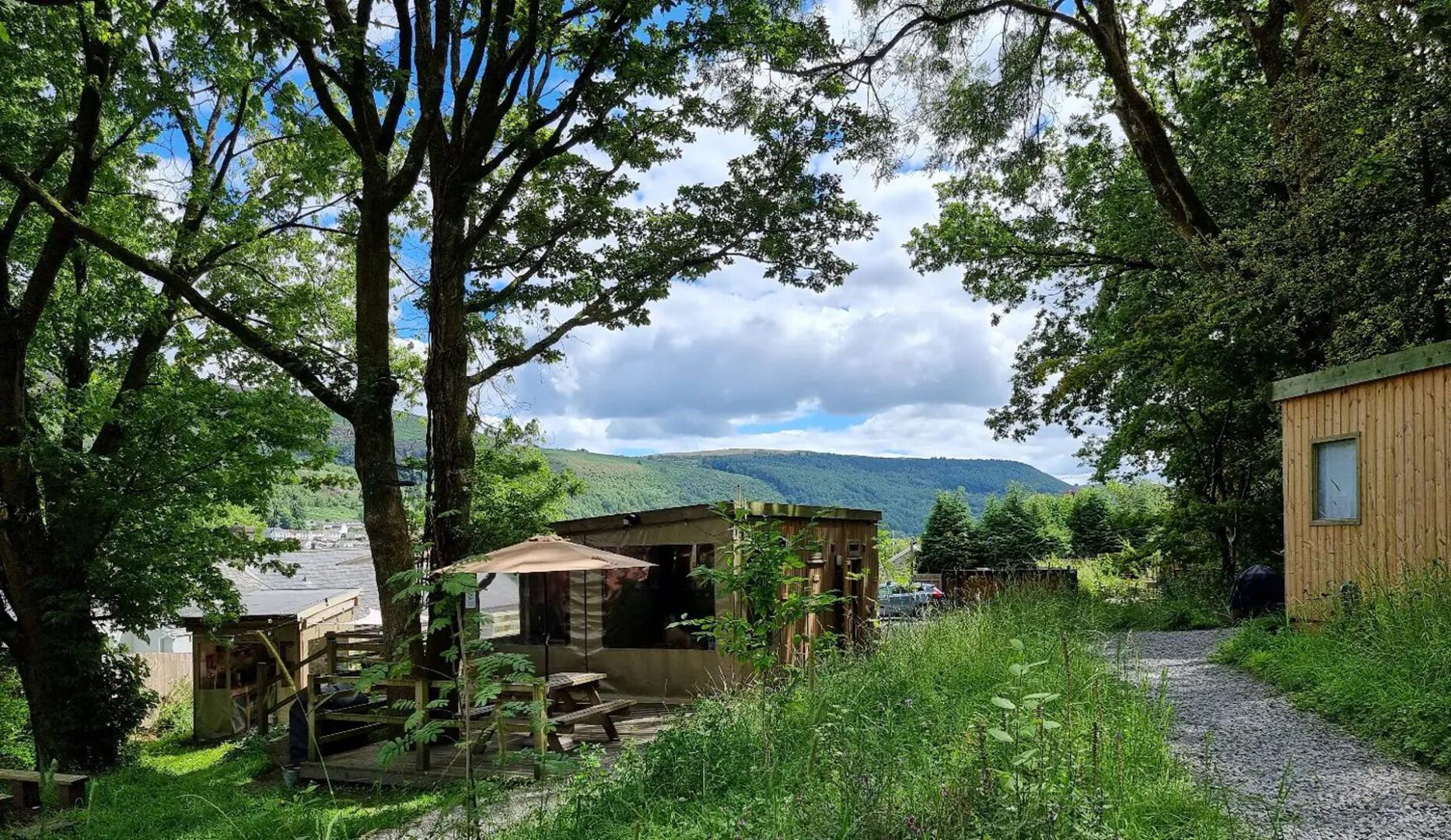 Cabins with mountains in the background