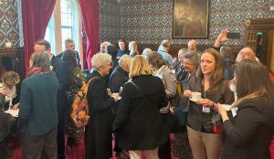 crowd of hostel owners and mps at independent hostels parliamentary reception