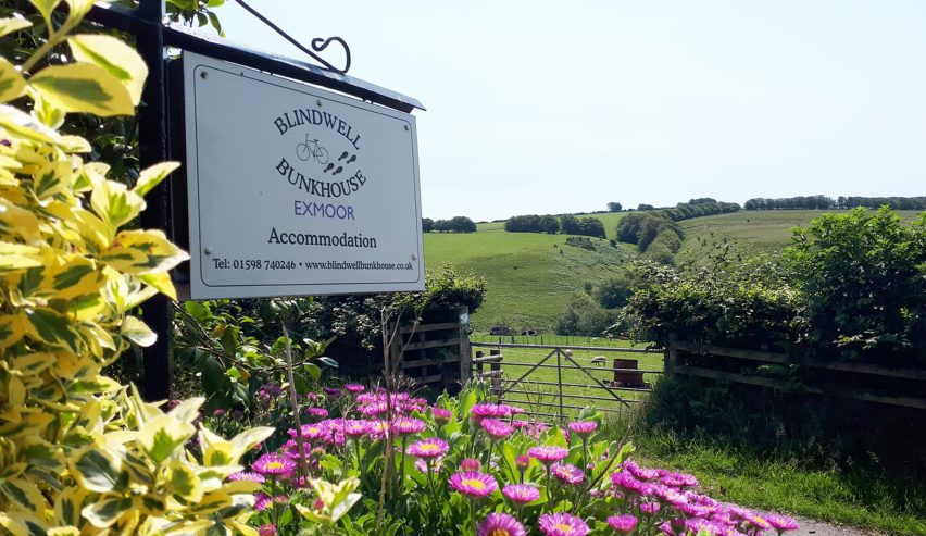 blindwell bunkhouse sign, flowers and fields
