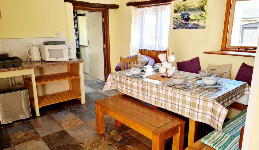 dining table set for breakfast at blindwell bunkhouse