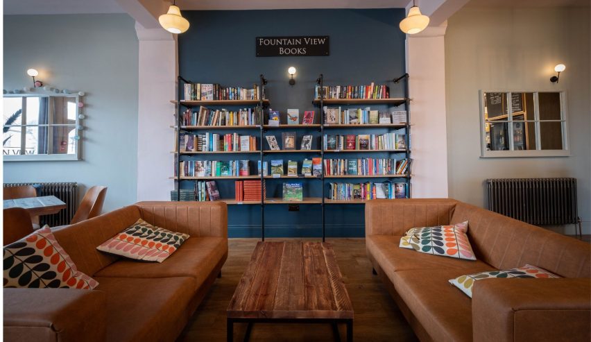 Book shelves and leather sofas