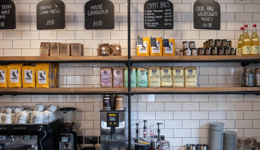 Cafe bar with menus and barrista machine