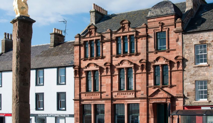 Exterior of red sandstone former library building, which is now a hostel