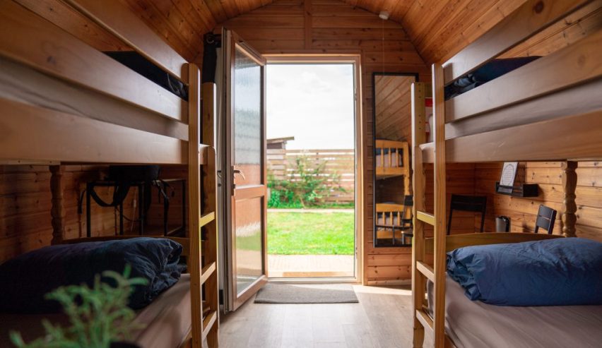 bunks in cabin with view out of the door