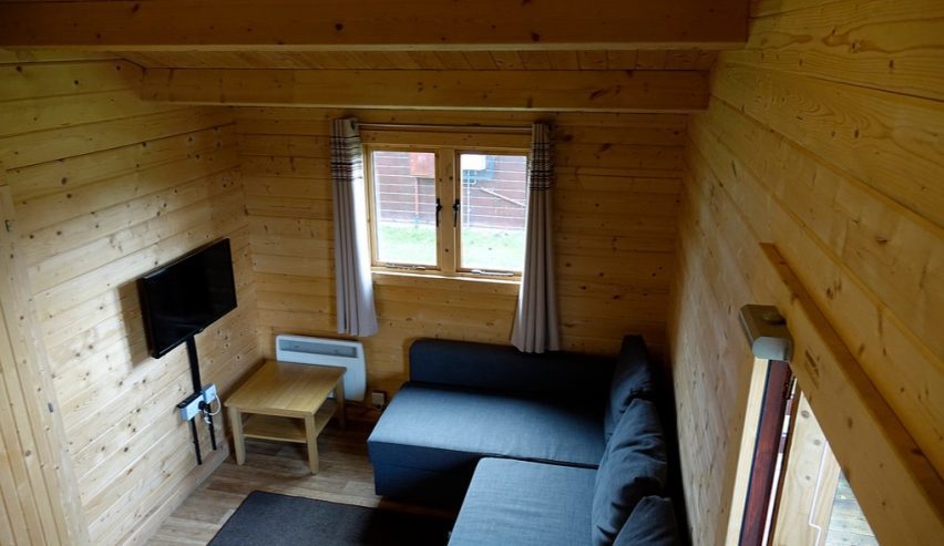 bunks in cabin with view to the back of the cabin