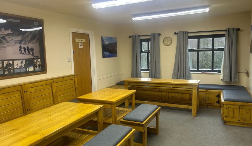 Dining room with pine tables and benches