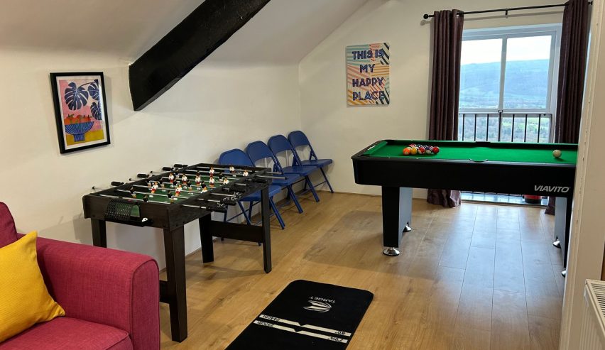 Games room with pool table and table football
