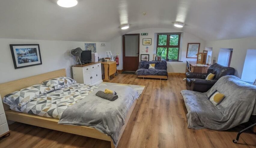 The Loft. Double bed and futons