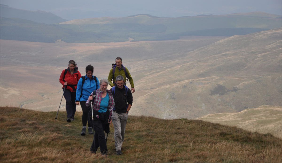 LDWA walkers walking a long distance path on moorland
