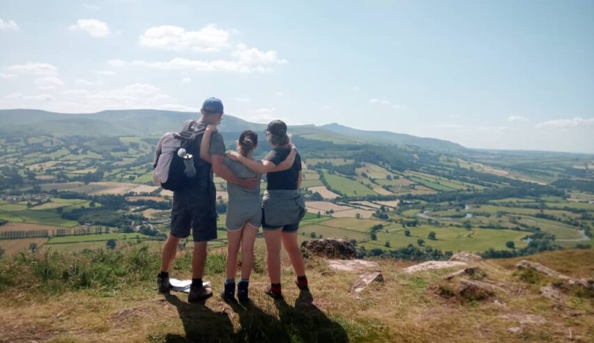family with view of Brecons while staying at Star Bunkhouse