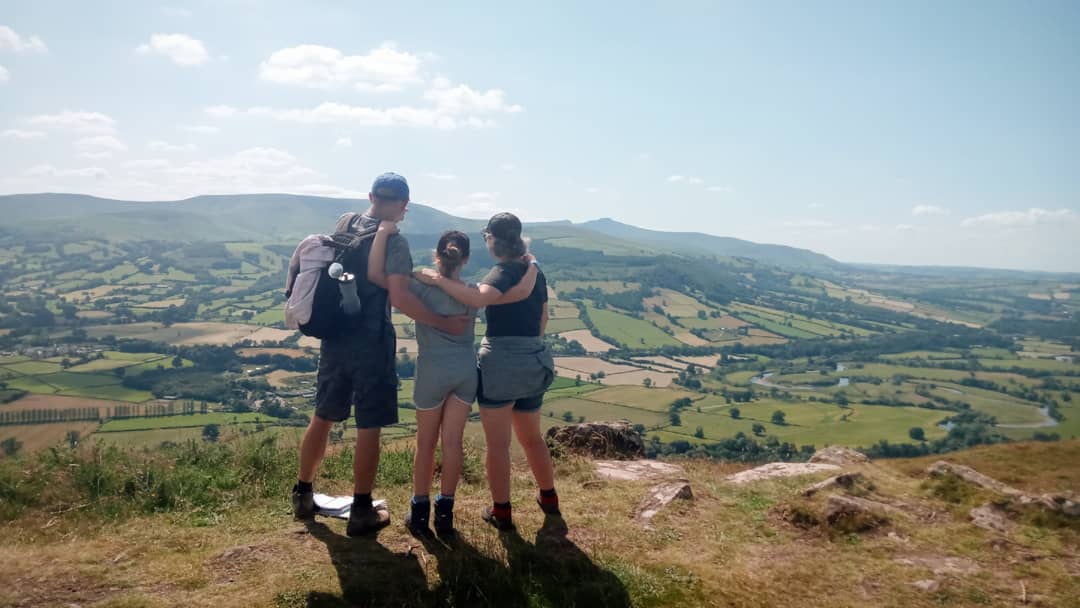 family with view of Brecons while staying at Star Bunkhouse