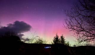 northern lights over the wild valley bunkhouse