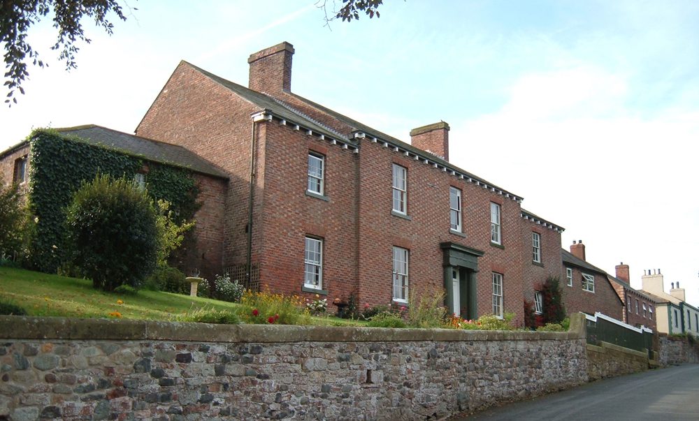 external view of geogian farmhouse at Hillside Farm walkers accommodation on the solway firth
