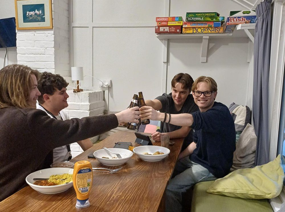 people toasting new freindships at Jordans Youth Hostel