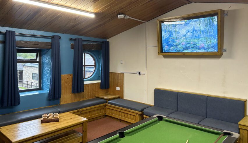 Games Room at Hagg Farm Outdoor Centre showing pool table and bench seating