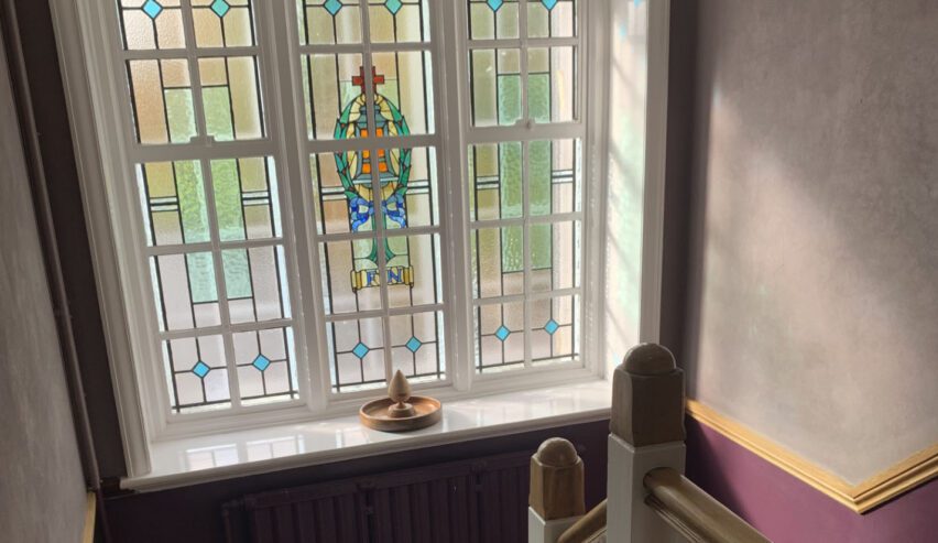 staine glass window in stairwell of the nightingale centre