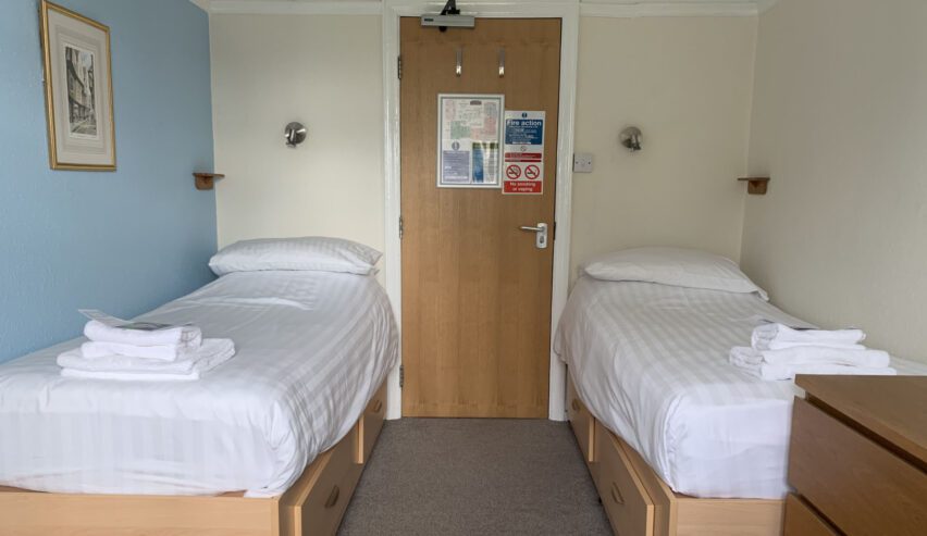 twin beds in a private bedroom at the nightingale centre