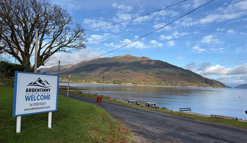 sign and view of loch at ardentinny outdoor centre