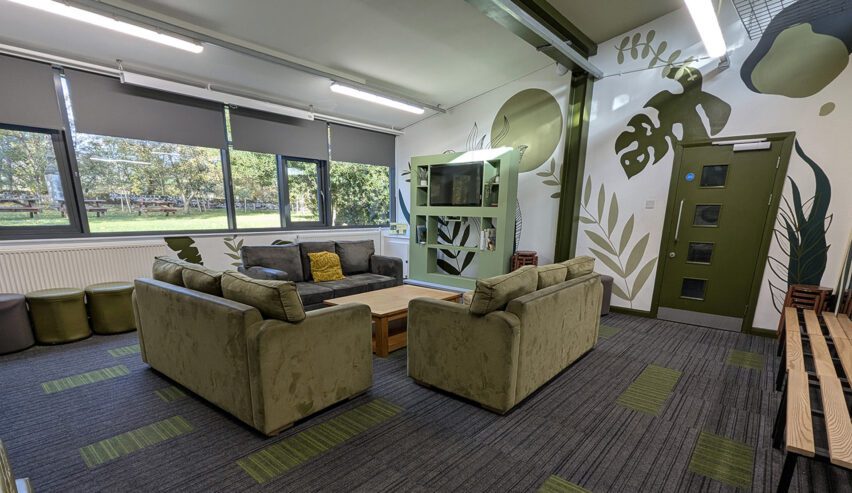 comfy sofas in the lounge at the lodge at Thornbridge Outdoors