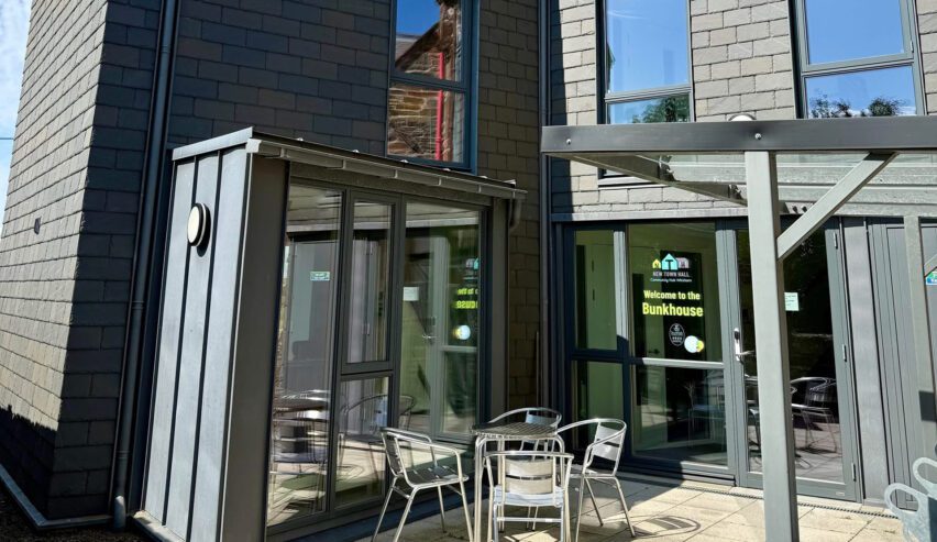 outside seating at new town hall bunkhouse whithorn in the sunshine