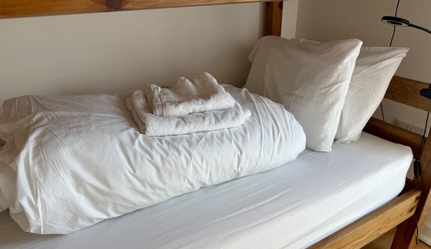 bunk ,ade up with fresh white bedlinen at new town hall bunkhouse whithorn