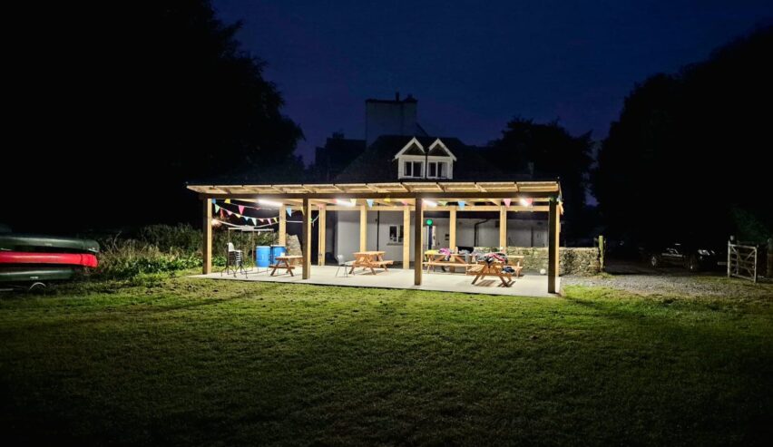 nightime view of covered patio at the Kepplewray centre floodlite