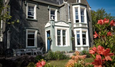 moffat hostels on the SWC 300 with flowers in the forground