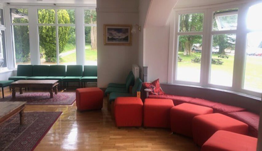 sofas and view of the lake from Ghyll Head activity centrel