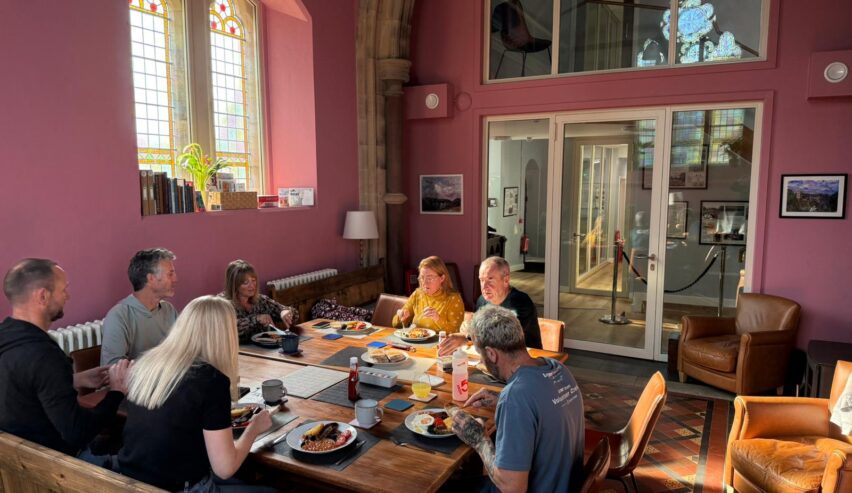 walkers eating an evening meal at st michaels lodge on the coast to coast path