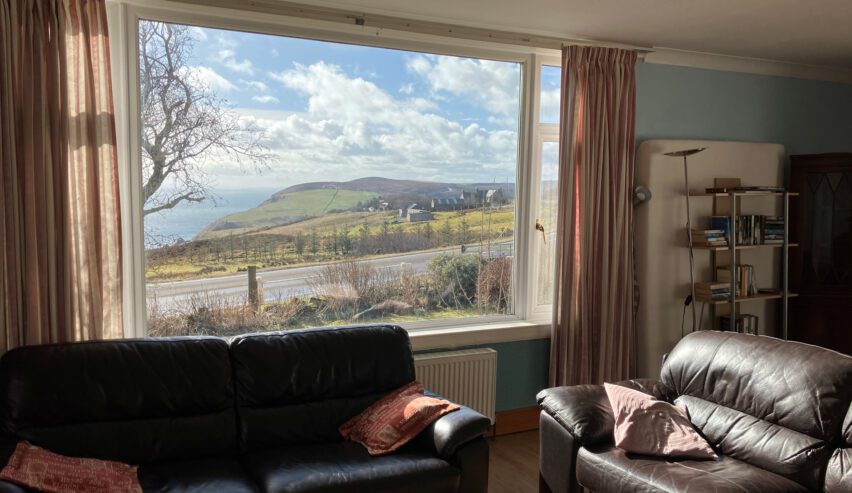 lounge with stunning view at Halfway House Berriedale Hostel