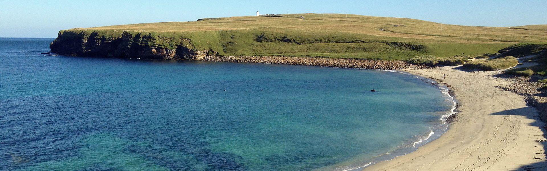 Bay of Sannick with Duncansby Head Lighthouse