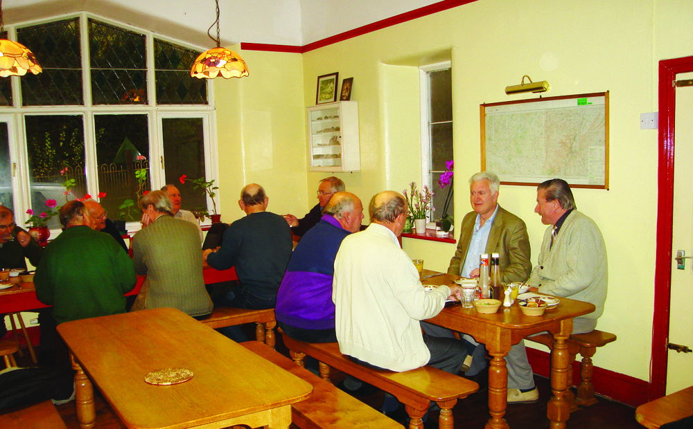 A group dining at Bridges Hostels at the end of the last century.