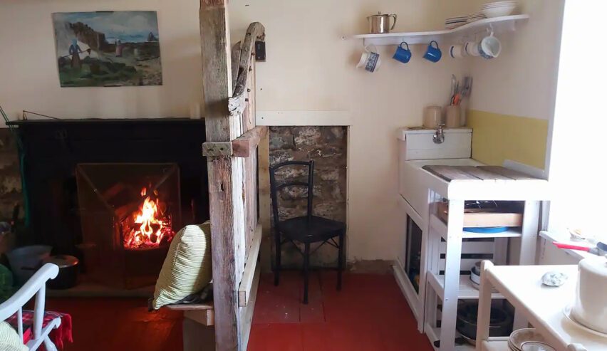 fire and kitchen at bearnus bothy on the isle of ulva