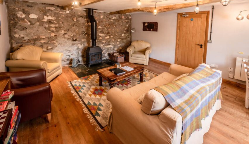 lounge with log burner Wild Wool Barn in Ennerdale