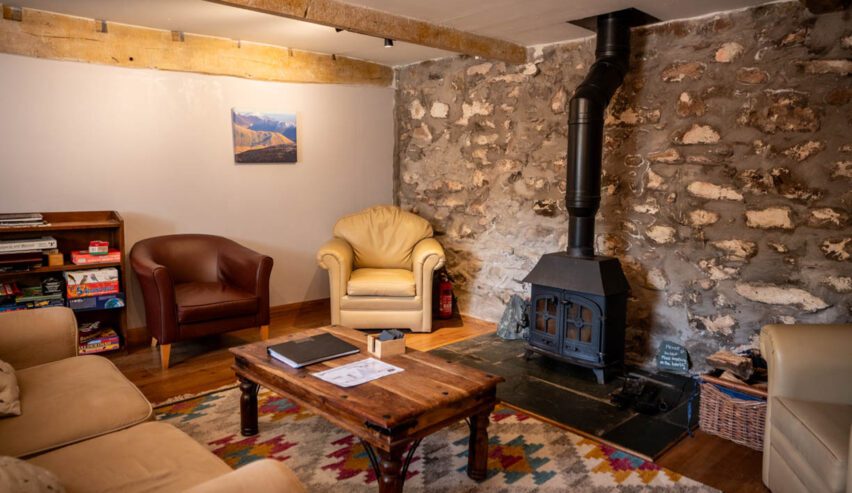 lounge with log burner Wild Wool Barn in Ennerdale