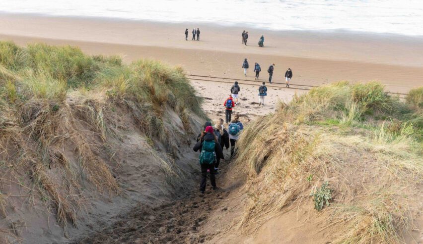 students on the beach during a school residentialsat skern adventure