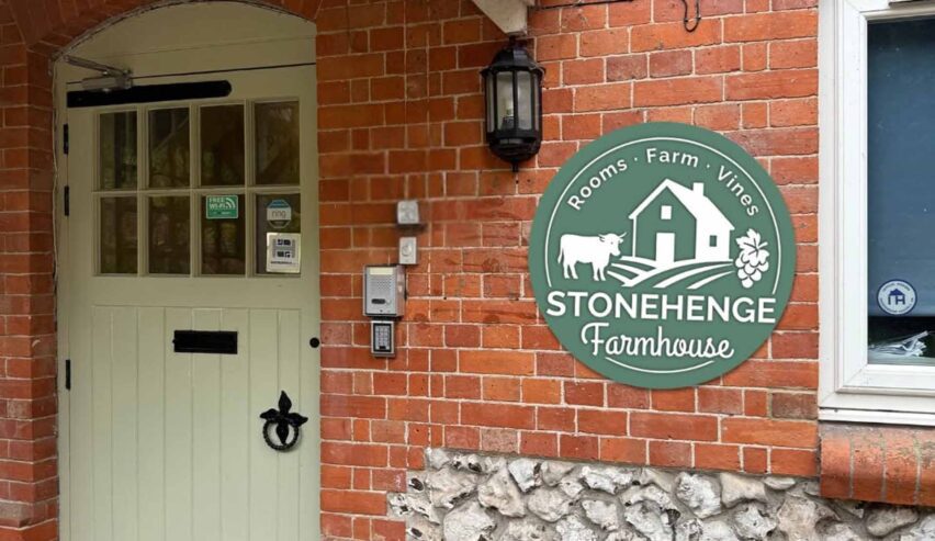 door and sign at stonehenge farmhouse hostel