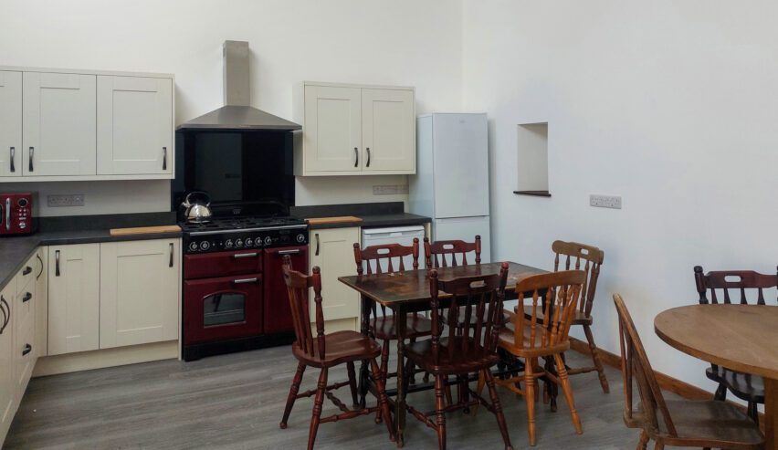 Kitchen and dining area at Cwm Clyd Bunkhouse