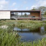 exterior view of FSC Margam Discovery Centre wih lake