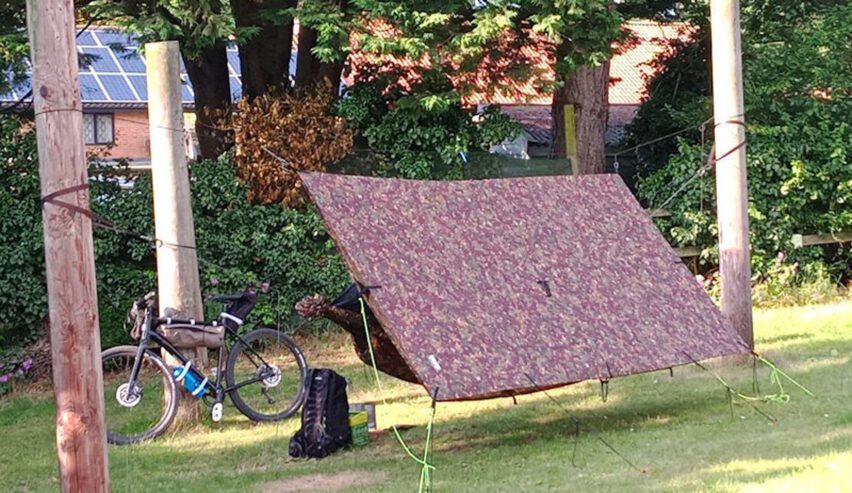 Hammock with tarpuline and bicycle at deepdale on the North Norfolk Coast