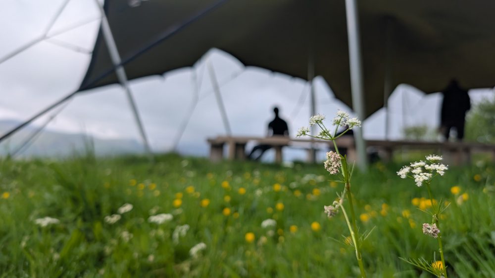 sharing food outdoors at wellbing rereat at the blencathra centre