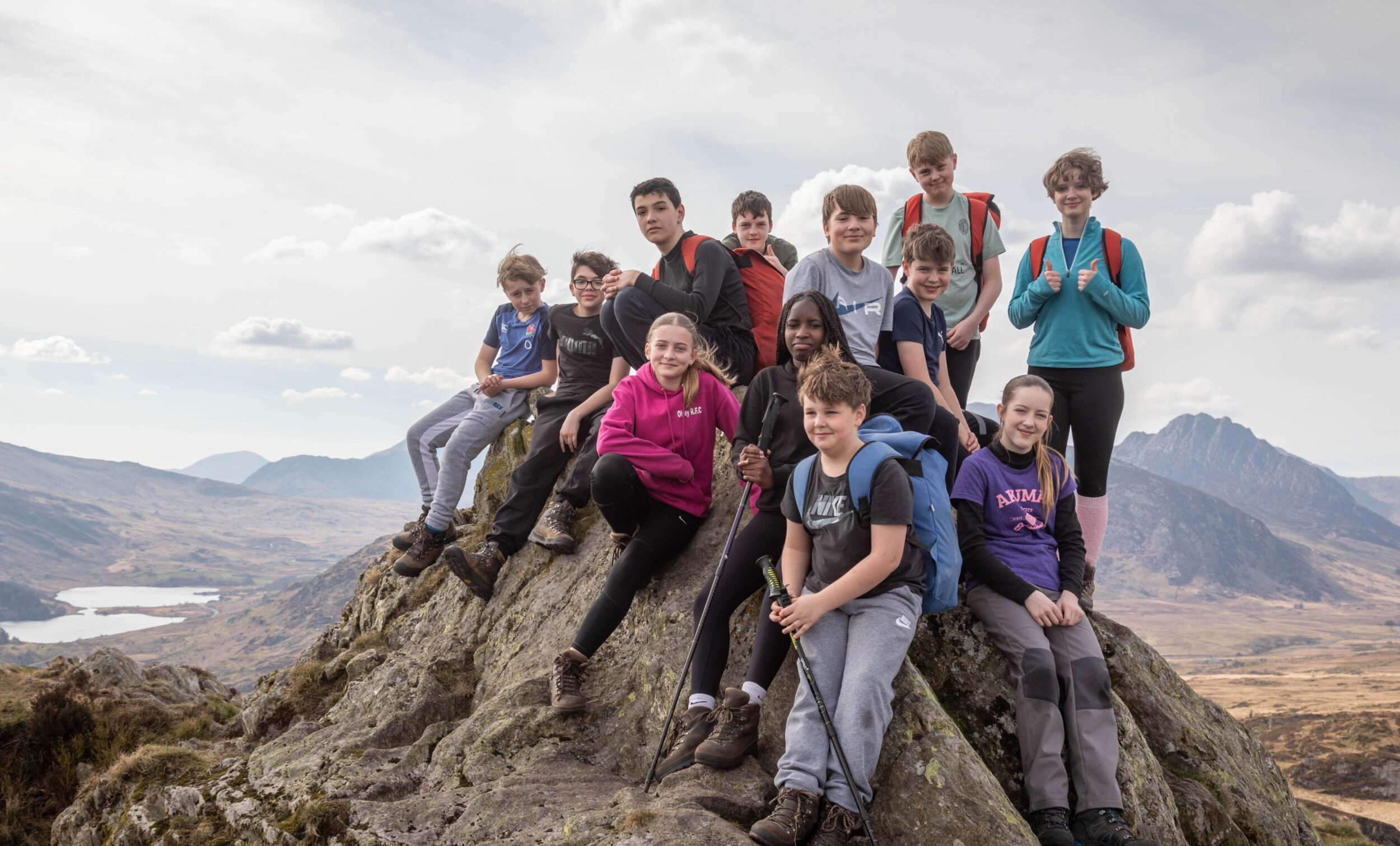 scout group on top of a hill in snowdonia