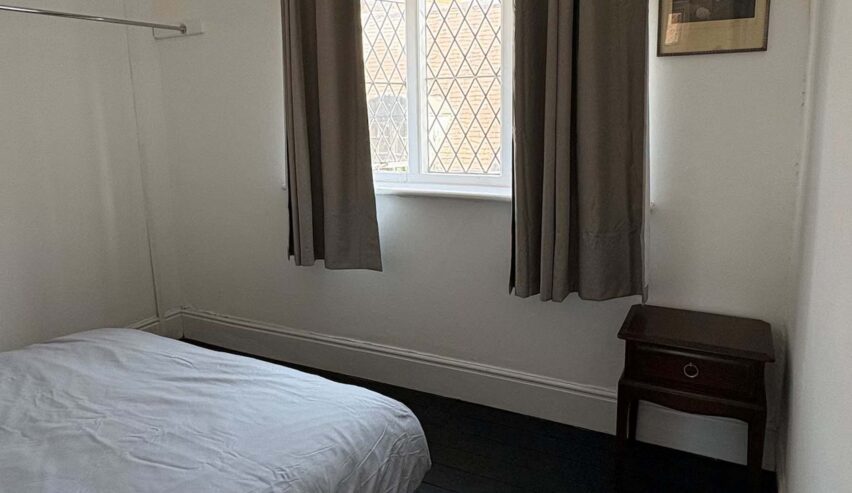bedroom at brocklebys pie shop accommodation