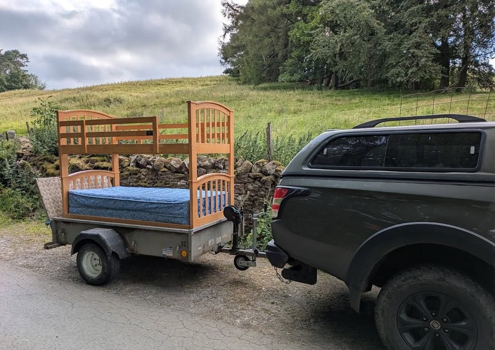 bunkbeds leaving Ninebanks youth hostel on their way to tanners hatch recently rescused hostel